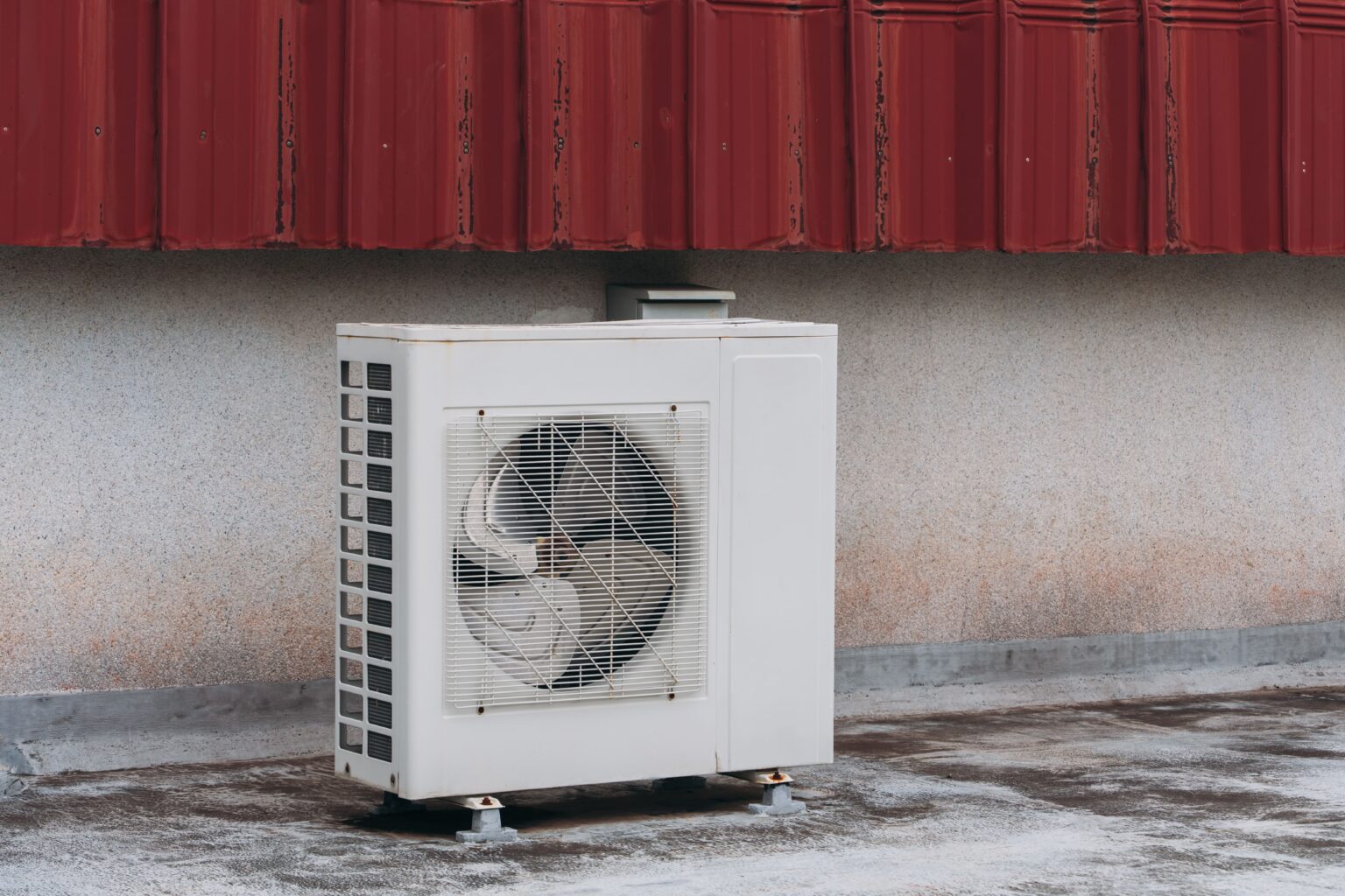 air-conditioner-compressor-is-set-up-on-the-roof-2025-03-16-02-08-44-utc (2) (1)
